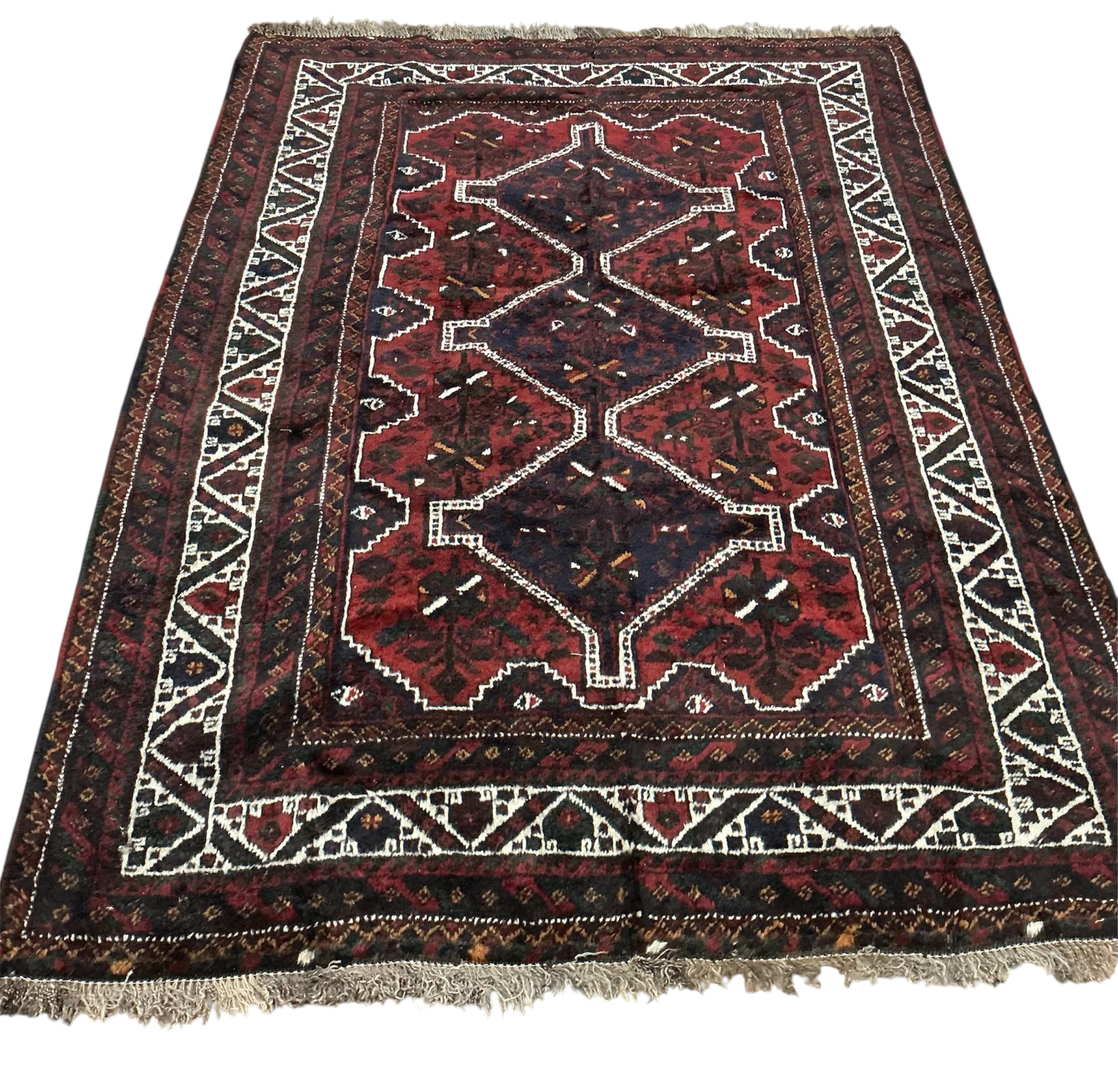 A Hamadan blue ground rug, 220cm x 160cm.